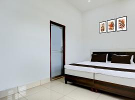 Hotel O NRI Guest House, ξενοδοχείο σε Rājpura