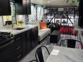 Sleek, Modern, Pet Friendly Custom Tour Bus!