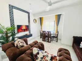 Cosy 2bdrm mombasa CBD pool gym washer AC