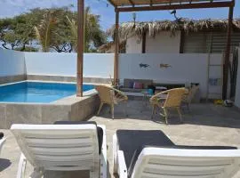 Casa de playa a metros del mar con piscina y BBQ