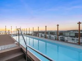 Coastal Apartment with Rooftop Pool