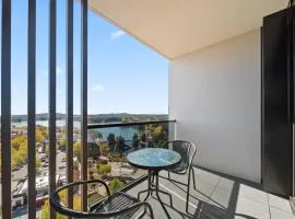 Sleek 2-Bed Apartment with Rooftop Garden Access