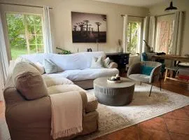 Spacious 2-bed, 2-bath villa with garden and parking