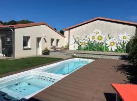 Appartement Les Marguerites spa et spa de nage