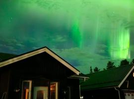 Riverfront Aurora Chalet, homestay in Kiruna