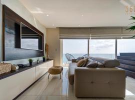 Mediterranean Luxury Stay with Sea Views & Jacuzzi by 360 Estates, Hotel in Xgħajra