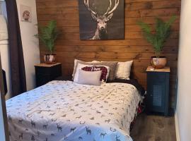 Le petit chalet Chertsey, hotel en Chertsey