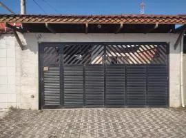 Casa Tupy próxima a praia e restaurantes