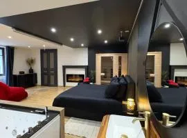 Parenthèse Enchantée pour Deux Spa privé sauna & vidéoprojecteur