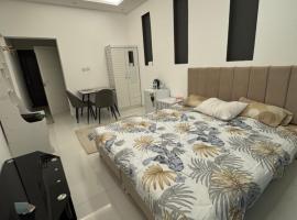 Near Airport Rooms, ξενοδοχείο σε Mawāliḩ