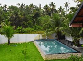 MeadowView Cottage Marari, hotel in Mararikulam
