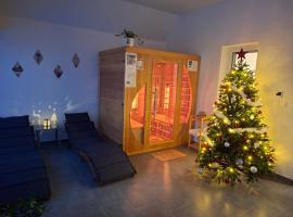 Napsugár Wellness Apartman, hotel en Újudvar