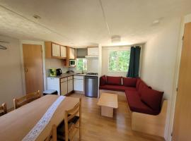 Stacaravan 6 persoons - Camping Le Soustran, ξενοδοχείο σε Neuvic