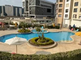 elegant one bedroom hotel appartment Porto New Cairo pool access