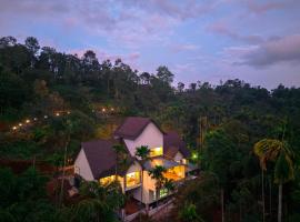 Achutham Cottages Wayanad by VOYE HOMES, chal&eacute; alpino em Padinjarathara