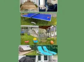 2 Zimmer Ferienwohnung mit Terrasse Grill Schaukel Tischtennis fußläufig zu S-Bahn nach München und See
