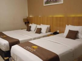 Grand Q Hotel Gorontalo, ξενοδοχείο με πάρκινγκ σε Telaga