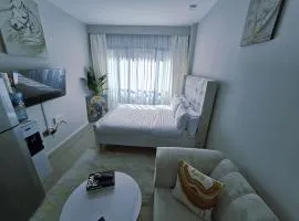 Roly Studio Apartment Near Jkia & Sgr with Swimming pool & Gym