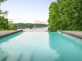 Secluded 3 Acre 5 BR Resort with Heated Private Lakeview Saltwater Infinity Pool, Hot Tub, Boat House, Sauna, and Game Room