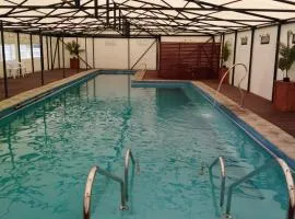 Adilauquén Cabañas, Piscina Temperada y Tinajas Calientes