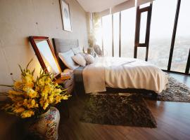 Puebla Skyline - Luxury Volcano View Apartment 1802、La Concepciónのホテル