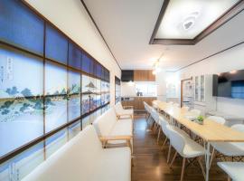 家族旅館四国周遊元山，位于高松的酒店