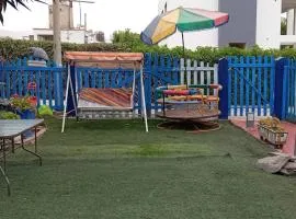 Encanto azul Jardín, Parrilla y juegos