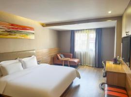 7天优品深圳龙岗大运中心爱联地铁站店, ξενοδοχείο στο Σενζέν