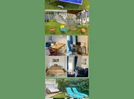 2 Zimmer Ferienwohnung mit Terrasse Grill Schaukel Tischtennis fußläufig zu S-Bahn nach München und See