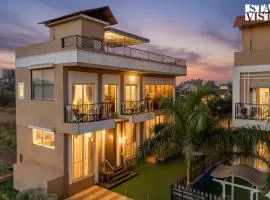 StayVista at The Chroma Crest with Lawn & Pool