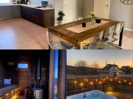 Winter cosiness with fireplace, sauna and hot tub!, ξενοδοχείο σε Tønsberg
