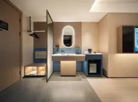 Huanman Hotel Qingdao Zhanqiao Zhongshan Road Metro Station Branch