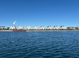 SeaPearl- Hafenblick, Terrasse, Bad mit Infrarotsauna und Whirlwanne, hotel sa Olpenitz
