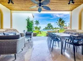 Stylish Split-Level Condo with a Shaded Terrace, Direct Beach Access, and Resort-Style Community Amenities