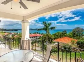 Elegant Oceanview Condo with Spacious Open-Concept Floor Plan and Inviting Beach Design