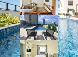 Apto Penha a 300M PRAIA 8 min do BETO CARREIRO com PISICNA, sacada com CHURRASQUEIRA privativa, AR CONDICIONADO Wi Fi, PORTARIA 24h,vaga privativa de GARAGEM