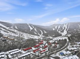 The refuge of the slopes, ski in, ski out, hotel in Stoneham