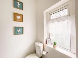 Coastal Comfort in The Mumbles 3BR Family Home