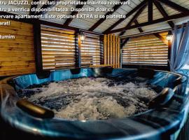 Premium Central Apartments - cu jacuzzi, terasa incalzita, parcare, ξενοδοχείο σε Ρίμνικου Βίλτσεα