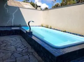 Praia de Leste Sobrado com piscina