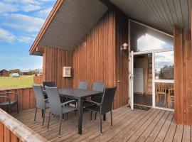 Cabin in camping resort with patio, hotel a Sønder Rubjerg