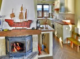 Holiday Home by Lake Rosnowskie with Boat