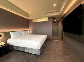 Hub Hotel Xintai, hotel en Taishan