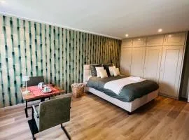 Chambre d'hôtes Lucia avec vue sur jardin arboré