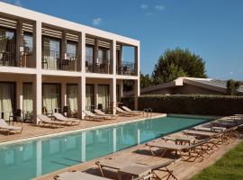 New Beach Hotel, hotel a Plános