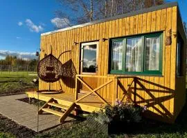 Sajūtu dārza mājiņa