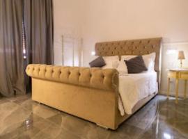 PALAZZO NOVECENTO Centro Storico Rooms & Wellness