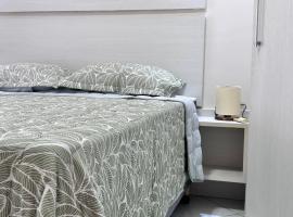 B484 - Apto 3 quartos perto do mar e com vista., hotel en Bombas