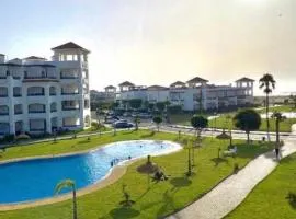 Appartement adil résidence beralmar avec jardin terasse