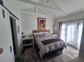 66onjennings Strand, hotel i Strand